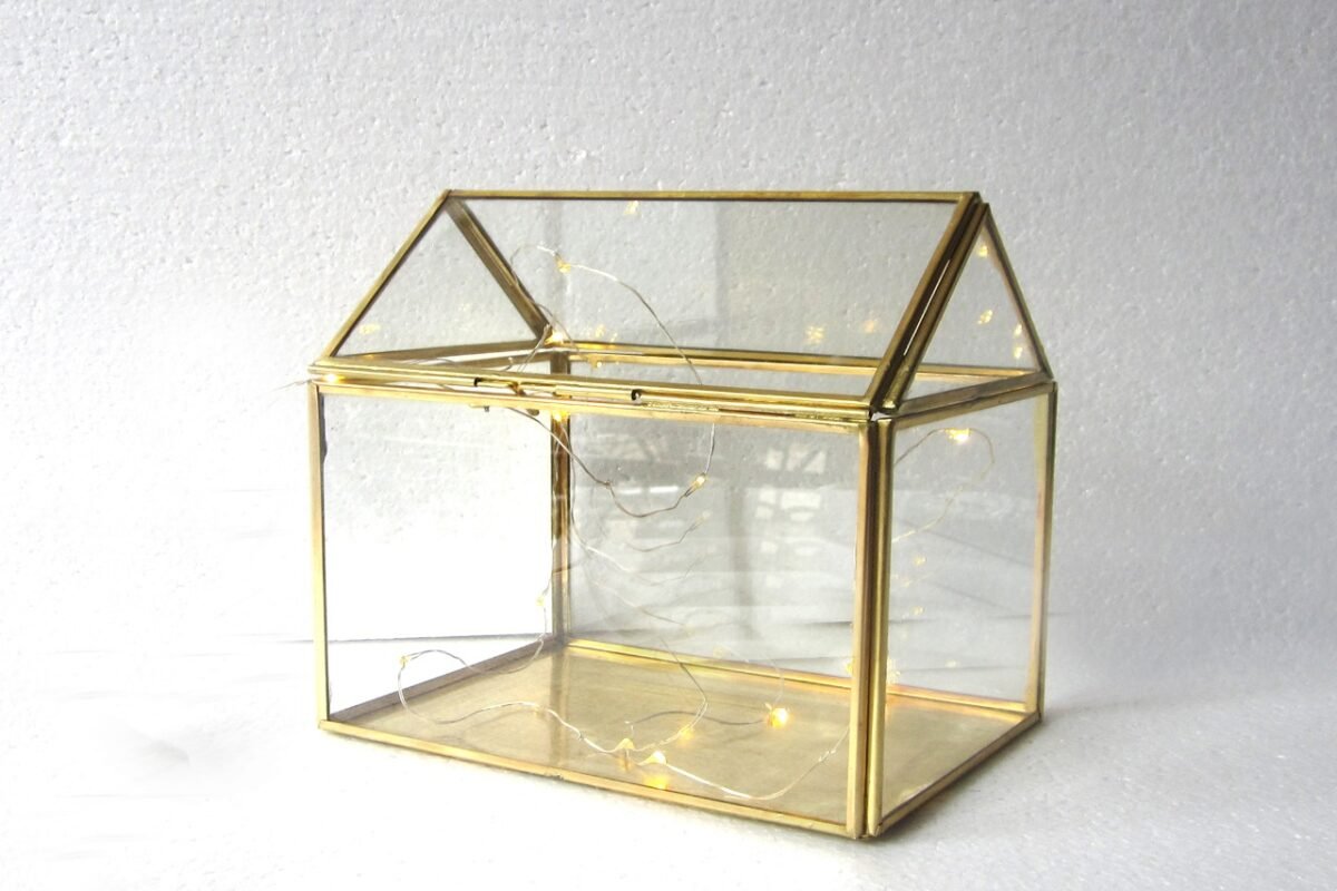 Glass Terrarium, Mirror Terrarium, Brass Terrarium, Planter, Candle Holder, House2home, h2h, Chocolate Packing, Gift, Brass Pyramid Terrarium, Hanging Brass Terrarium, Brass Geometric Terrarium, Pyramid Plant Holder, Glass and Brass Planter, Brass Hanging Planter, Decorative Brass Terrarium, Indoor Brass Terrarium, Outdoor Brass Terrarium, Succulent Brass Terrarium, Air Plant Terrarium Brass, Terrarium for Tabletop Decor, Centerpiece Terrarium, Brass Planter for Living Room, Terrarium for Office Desk, Brass Plant Holder for Balcony, Brass Terrarium for Hotels, Brass Decor for Restaurants, Hanging Terrarium for Cafe Decor, Brass Terrarium for Reception Desk, Wedding Centerpiece Terrarium, Terrarium for Gifting, Housewarming Brass Terrarium, Diwali Brass Terrarium, Modern Brass Home Decor, Geometric Hanging Planter, Pyramid Glass Planter, Brass and Glass Plant Holder, Decorative Indoor Terrarium, Luxury Brass Terrarium Gift, Contemporary Brass Decor, Premium Brass Planter, Brass Terrarium for Plants, Eco-Friendly Brass Planter, Minimalist Brass Terrarium, Table Decor Brass Terrarium, Terrarium for Succulent Arrangement, Hotel Room Decor Planter, Office Table Planter Brass, Hanging Decor Brass Terrarium, Festive Brass Decor, Multipurpose Brass Terrarium, Elegant Planter for Corporate Gift, Terrarium Hamper Holder, Brass Terrarium for DIY Hampers, Gift Hamper Brass Terrarium, Pyramid Shape Planter, Handcrafted Brass Terrarium, Terrarium for Entryway Decor, Rustic Brass Plant Holder, Brass Pyramid for Air Plants, Glass Planter for Herbs, Brass Holder for Gifting Plants, Giftable Planter Terrarium, Transparent Pyramid Planter, Vintage Look Brass Terrarium, Ornamental Brass Terrarium, Center Table Brass Decor, Hotel Lobby Decor Planter, Eco Chic Terrarium Brass, Boho Decor Terrarium, Planter for Indoor Garden, Decor Prop Brass Terrarium, Designer Terrarium Planter, Geometric Plant Display, Glass and Metal Hanging Planter, Artisanal Brass Terrarium, Multi-Use Planter, Pyramid Decor Accent, Modern Decor Glass Terrarium, Luxe Brass Planter, Metal Frame Glass Terrarium, Gift Set Planter Holder, Vertical Hanging Terrarium, Showcase Terrarium Decor, Terrarium for Zen Decor