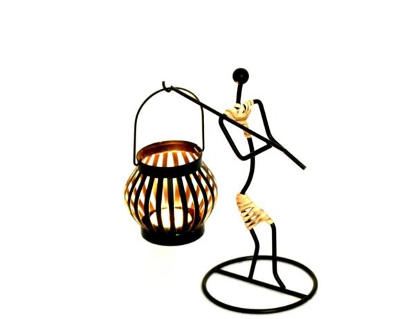 Lantern Lady Set Candle Holder is inspired from traditional Bastar Arts & Crafts and its been blended in to closest imitation. The construction of the Candle Holder gives a dramatic look of shadow and light and feel in its appearance. The Candle holders can be used with LED Candles, Wax Candles, as well as decorative. The product is hand crafted & assembled in multiple layers of refined processes, by skilled artisans. Each Lantern is finished with multiple layers of coating, which makes it resistant, and gives it a longer shelf life. Each product is Quality checked at multiple layers and processes. Creatively this product can be used for various purpose and occasions, Can be used for Wedding Gift, Party Decoration, indoor and outdoor for lawns gardens etc. It is an ideal gift for a housewarming, an ideal gift for a colleague or friend. Light and Shadow effect gives it a perfect mood for decoration at various occasions. Candle Holder can be on the table for indoor and outdoor. Each set of 3 pcs packed in a brown corrugated box. Size 5 inches Available Colors - Matte Gold & Natural Cane Disclaimer - All products are handmade and are subject to variation. Not 2 products will be 100% same. All our products are handcrafted by skilled Artisans, Made in India.