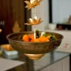 Aura Hanging Metal Urli - 29x8 inch Black Gold 9 Urli, Lotus Urli, Petal Shaped Urli, Metal Urli, Hamper Basket, Gift Pack, Home Decor, Decorative, Party Decoration, Table Decor, house warming, house2home, h2h, flower decoration, lotus Urli, Hamper Pack, Gift Basket, Holiday Basket, parat, decor, decorative, flower decoration, home decor, diwali Decor, Return Gift, Diwali Gift, Hanging Urli, Decorative Hanging Urli, Traditional Hanging Urli, Indian Hanging Urli, Metal Hanging Urli, Home Decor Hanging Urli, Outdoor Hanging Urli, Brass Hanging Urli, Copper Hanging Urli, Large Hanging Urli, Small Hanging Urli, Hanging Urli for Pooja, Garden Hanging Urli, Handcrafted Hanging Urli, Antique Hanging Urli, Hanging Urli with Bells, Festive Hanging Urli, Hanging Urli Design, Ethnic Hanging Urli, Wall Hanging Urli