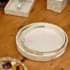 MOP Round Tray 2pcs Set 14, 12 inch (Sea Shell Chips) 2 Mother of Pearl Chocolate Packing Trays, MOP Coasters, Coated trays, MOP Tray Set, MOP Cutlery Stand, MOP Dining table decor, Mother of Pearl Diwali Gift, MOP Drawer, MOP dry fruit box, Dry Fruit Packing Trays & Hamper, Eco friendly, Sea Shell trays, Shell Tray Sets, Mother of Pearl Serving trays, Mother of Pearl Gift box, h2h, Mother of Pearl Hamper Basket, Mother of Pearl Hamper Pack, Mother of Pearl Hamper Packing Tray Sets, Mother of Pearl Manufacturer & Wholesaler in Moradabad, MOP Holiday Hamper, Mother of Pearl home decorative Trays, House 2 home, house warming, House2home, Househome, Manufacturer, Mother of Pearl Cutlery Stand, Mother of Pearl MOP Drawer set, MDF Trays Manufacturing industry, Sea Shell Trays, Shell Trays, Mother of Pearl tray Manufacturers, MOP Tray Sets, MOP Mother of Pearl Shell Trays, Mother of Pearl Meena Coated Trays, Silver Shell Trays, Mother of Pearl Crafts Manufacturer in Moradabad, MOP Trays whole sellers in Moradabad, MOP Hamper Trays Manufacturer, Epoxy Coated Trays manufacturers in India, modern MOP hamper trays, Mother of Pearl platter, Moradabad brassware gifts, Moradabad handicraft exporters, Moradabad MDF exporter, Moradabad Mother of Pearl Sets Manufacturer, Moradabad Mother of Pearl crafts, MOP Trays & gifts Manufacture & Whole seller, Mother of Pearl Hamper Trays Manufacturer in Moradabad, Mother of Pearl Trays for Home Decor, MOP Napkin Holder, MOP Packaging Trays, Party Gifts, Mother of Pearl Platter, Mother of Pearl, MOP Gift boxes, MOP Tray, Shell Tray Sets, MOP trays, Raisin Trays Sets, Return Gift, Serving Platter, serving tray, set, snack platter, Snack Serving Stand, Square hamper Basket, Mother of Pearl tissue Holder, Tray Sets, trousseau packing, water proof tray, water repellant, water Repellent finish, Wedding Gift, wood, wooden, Wooden art ware Moradabad, wooden cake stand, Wooden gift manufacturers in Moradabad, Wooden Handicraft Manufacturer, MOP Handicrafts, Wooden Manufacturers Moradabad, MOP Platter, Wooden tray, Mother of Pearl Square Tray Set