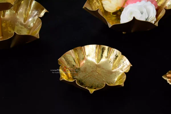 Diwali gift, Small decorative urli, Gold lotus urli, Lotus shaped urli, Metal urli, Decorative metal urli, Gold color urli, Urli for gifting, Wedding gift urli, Decorative gift urli, Gold gift urli, Lotus decoration urli, Urli for hampers, Wedding decor urli, Small gold urli, Lotus urli gift, Gifting metal urli, Decorative gold urli, Lotus candle holder, Potpourri decoration urli, Urli for wax filling, Dry fruit packing urli, Lotus potpourri urli, Decorative candle urli, Small gold lotus urli, Metal lotus urli, Urli with gold finish, Decorative wedding urli, Lotus shaped gift urli, Gold metal urli, Small lotus decor, Wedding favor urli, Decorative centerpiece urli, Lotus shaped candle holder, Gold potpourri urli, Metal lotus candle holder, Lotus wax filling urli, Gift packing urli, Gold lotus decoration, Lotus urli for weddings, Lotus shaped potpourri, Lotus shaped wax urli, Gold decorative urli, Gold lotus candle holder, Metal gold urli, Lotus shaped decorative piece, Small gold decoration urli, Lotus wedding gift, Lotus shaped centerpiece, Urli for dry fruits, Gold gift decoration, Lotus shaped wax holder, Wedding gift packaging, Urli for candles, Small decorative lotus, Gold lotus ornament, Decorative wedding gift, Lotus shaped potpourri holder, Metal lotus wax urli, Lotus shaped decor, Small gold potpourri holder, Wedding gift urli, Lotus candle decoration, Decorative gold lotus, Urli for wax decoration, Lotus urli centerpiece, Gold lotus candle decoration, Small gold wedding gift, Lotus shaped gift packaging, Decorative lotus wax holder, Gold metal decoration, Urli for decorative gifts, Lotus shaped metal urli, Small gold lotus candle holder, Gold decorative piece, Urli for wedding decor, Lotus shaped dry fruit holder, Decorative gold metal urli, Lotus candle holder decoration, Small gold lotus decor, Lotus shaped potpourri decoration, Gold wedding decoration, Decorative wax urli, Lotus shaped candle decor, Small decorative wedding gift, Gold potpourri decoration urli, Metal lotus decorative piece, Lotus shaped wax decoration, Decorative wedding centerpiece, Urli for festive decor, Lotus shaped candle gift, Gold metal decorative piece, Lotus shaped wedding decor, Decorative gold wedding gift, Small lotus wax holder, Lotus shaped potpourri gift, Gold decorative candle holder, Urli for potpourri decoration, Lotus shaped gift decor, Small gold gift urli, Candle holder, Tlight, Home Decorative, Hamper Tray, Return Gift, Corporate Gift, Metal Decorativem Dry Fruit Packing, Home Decor, Diwali Decorative, h2h, house2home