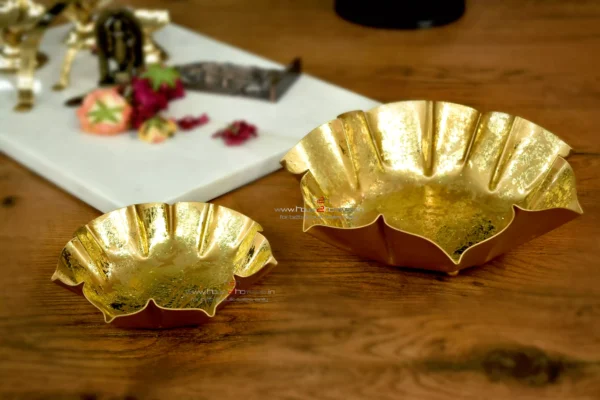 Diwali gift, Small decorative urli, Gold lotus urli, Lotus shaped urli, Metal urli, Decorative metal urli, Gold color urli, Urli for gifting, Wedding gift urli, Decorative gift urli, Gold gift urli, Lotus decoration urli, Urli for hampers, Wedding decor urli, Small gold urli, Lotus urli gift, Gifting metal urli, Decorative gold urli, Lotus candle holder, Potpourri decoration urli, Urli for wax filling, Dry fruit packing urli, Lotus potpourri urli, Decorative candle urli, Small gold lotus urli, Metal lotus urli, Urli with gold finish, Decorative wedding urli, Lotus shaped gift urli, Gold metal urli, Small lotus decor, Wedding favor urli, Decorative centerpiece urli, Lotus shaped candle holder, Gold potpourri urli, Metal lotus candle holder, Lotus wax filling urli, Gift packing urli, Gold lotus decoration, Lotus urli for weddings, Lotus shaped potpourri, Lotus shaped wax urli, Gold decorative urli, Gold lotus candle holder, Metal gold urli, Lotus shaped decorative piece, Small gold decoration urli, Lotus wedding gift, Lotus shaped centerpiece, Urli for dry fruits, Gold gift decoration, Lotus shaped wax holder, Wedding gift packaging, Urli for candles, Small decorative lotus, Gold lotus ornament, Decorative wedding gift, Lotus shaped potpourri holder, Metal lotus wax urli, Lotus shaped decor, Small gold potpourri holder, Wedding gift urli, Lotus candle decoration, Decorative gold lotus, Urli for wax decoration, Lotus urli centerpiece, Gold lotus candle decoration, Small gold wedding gift, Lotus shaped gift packaging, Decorative lotus wax holder, Gold metal decoration, Urli for decorative gifts, Lotus shaped metal urli, Small gold lotus candle holder, Gold decorative piece, Urli for wedding decor, Lotus shaped dry fruit holder, Decorative gold metal urli, Lotus candle holder decoration, Small gold lotus decor, Lotus shaped potpourri decoration, Gold wedding decoration, Decorative wax urli, Lotus shaped candle decor, Small decorative wedding gift, Gold potpourri decoration urli, Metal lotus decorative piece, Lotus shaped wax decoration, Decorative wedding centerpiece, Urli for festive decor, Lotus shaped candle gift, Gold metal decorative piece, Lotus shaped wedding decor, Decorative gold wedding gift, Small lotus wax holder, Lotus shaped potpourri gift, Gold decorative candle holder, Urli for potpourri decoration, Lotus shaped gift decor, Small gold gift urli, Candle holder, Tlight, Home Decorative, Hamper Tray, Return Gift, Corporate Gift, Metal Decorativem Dry Fruit Packing, Home Decor, Diwali Decorative, h2h, house2home