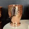 A polished, hammered copper vessel designed to shine in Diwali hampers and traditional Dhanteras gifting