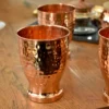 Our signature hammered copper tumbler, a refined choice for elegant shaadi return gift hampers and ceremonies.