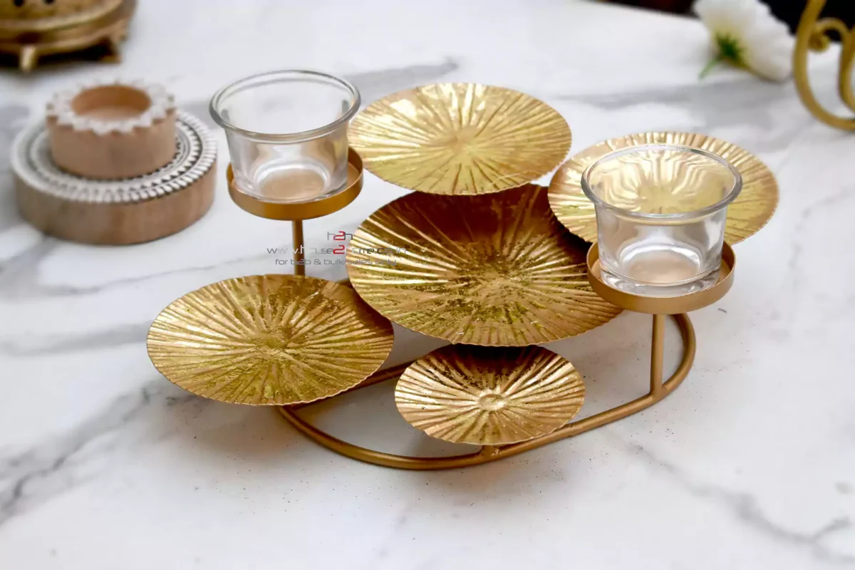 A sophisticated brass lotus candle stand, perfect for luxury shaadi return gifts and wedding decor hampers