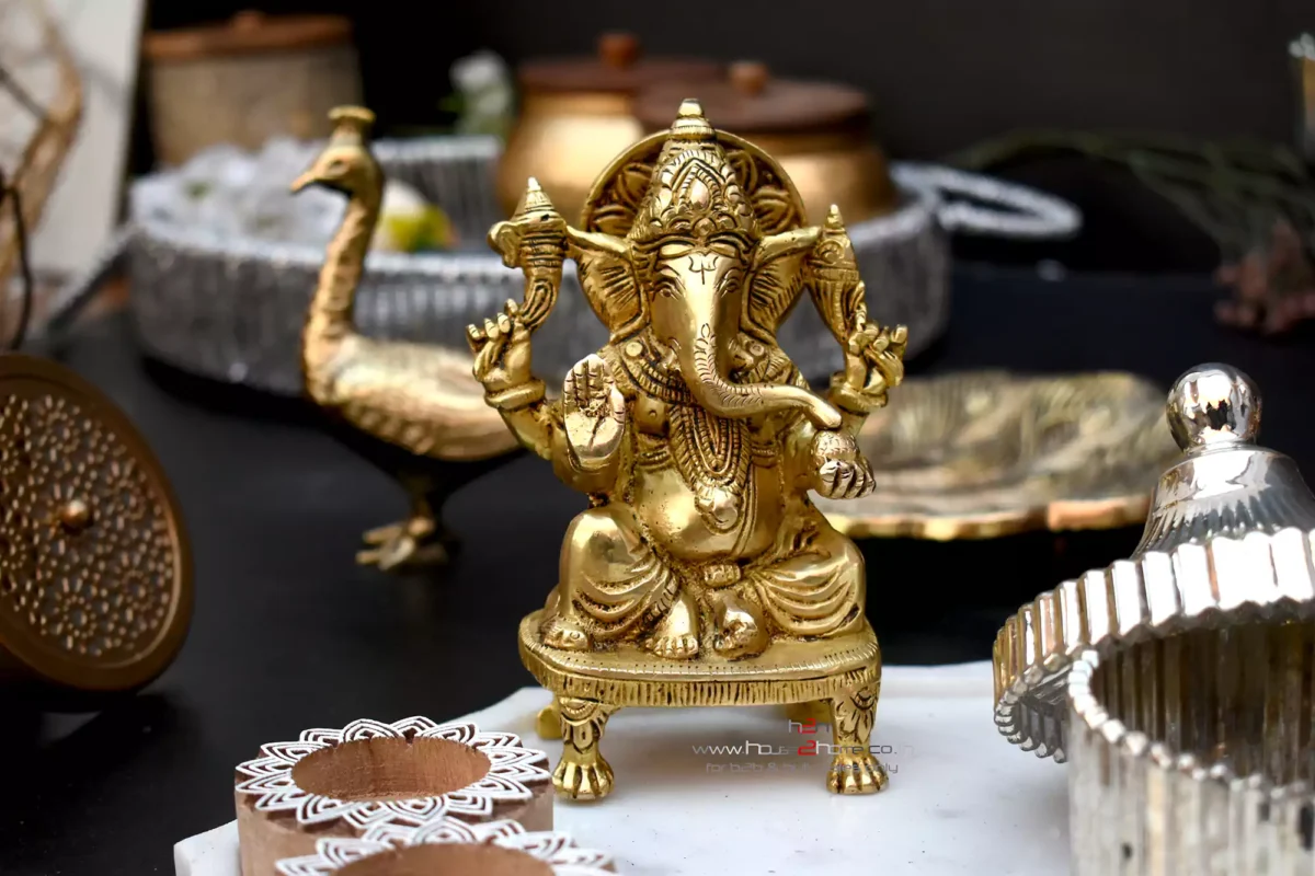 Brass idol, Ganesh murti, Ganesha idol, brass Ganesha, pooja idol, brass statue, pital murti, wedding return gift, Diwali gift, spiritual gift, Indian decor, home mandir idol, vastu idol, pital ganesha, house warming gift, festive return gift, ganpati brass idol, traditional brass murti, temple decor, handmade idol, metal sculpture, brass home decor, brass ganpati, ganesha brass idol, gifting idol, Indian brass art, Hindu god idol, pooja decor, diwali pooja item, ganesha gift item, brass god idol, return gift for pooja, god statue for mandir, brass divine idol, Lakshmi Ganesh murti, brass decor showpiece, vastu Ganesh idol, navratri gift, rakhi gift, karwachauth gift, house decor ganesha, premium brass gift, unique festive gift, gold finish idol, sitting ganesha idol, mandir accessory, hand carved brass, Indian festival gift, ganesh chaturthi idol, artisanal brass idol, pital ki murti, गणेश मूर्ति, पीतल गणेश जी, पूजा मूर्ति, पीतल मूर्ति, शादी का तोहफा, दीपावली उपहार, गृह प्रवेश तोहफा, தமிழ் விநாயகர் சிலை, ஹோம்டெக்கர் சிலை, పిత్తల వినాయకుడు, పూజా విగ్రహం, ಹಿಂದು ದೇವರು ವಿಗ್ರಹ, ಮನೆ ಪ್ರವೇಶ ಉಡುಗೊರೆ, தங்க அலங்காரம் சிலை, పండుగ బహుమతి విగ్రహం, பவித்ர பரிசு, ગુજરાતી પીતળ મૂર્તિ, લગ્ન ભેટ માટે મૂર્તિ, પીતળની ગણેશજી મૂર્તિ, மராத்தி पितळ मूर्ती, गणपती मूर्ती, घरासाठी मूर्ती, മലയാളം വിഗ്രഹം, വീട്ടിലെ പ്രതിമ, விழா സമ്മാനം, brass sculpture, traditional idol, ganesha for prosperity, luck bringing idol, decorative murti, Indian brass work, heritage handicraft, finely crafted idol, solid brass figurine, sacred gift, divine décor, holy gift item, artisanal metalwork, idol for gifting, god idol for home, diwali decoration idol, ethnic decor idol, home blessing gift, pital statue, vrat gift item, pooja room décor, brass deity idol, luxury return gift, handmade Hindu idol, South Indian décor idol, elegant brass murti