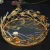 This golden floral tray is perfect for showcasing sweets and festive offerings during Diwali and Dhanteras collections.