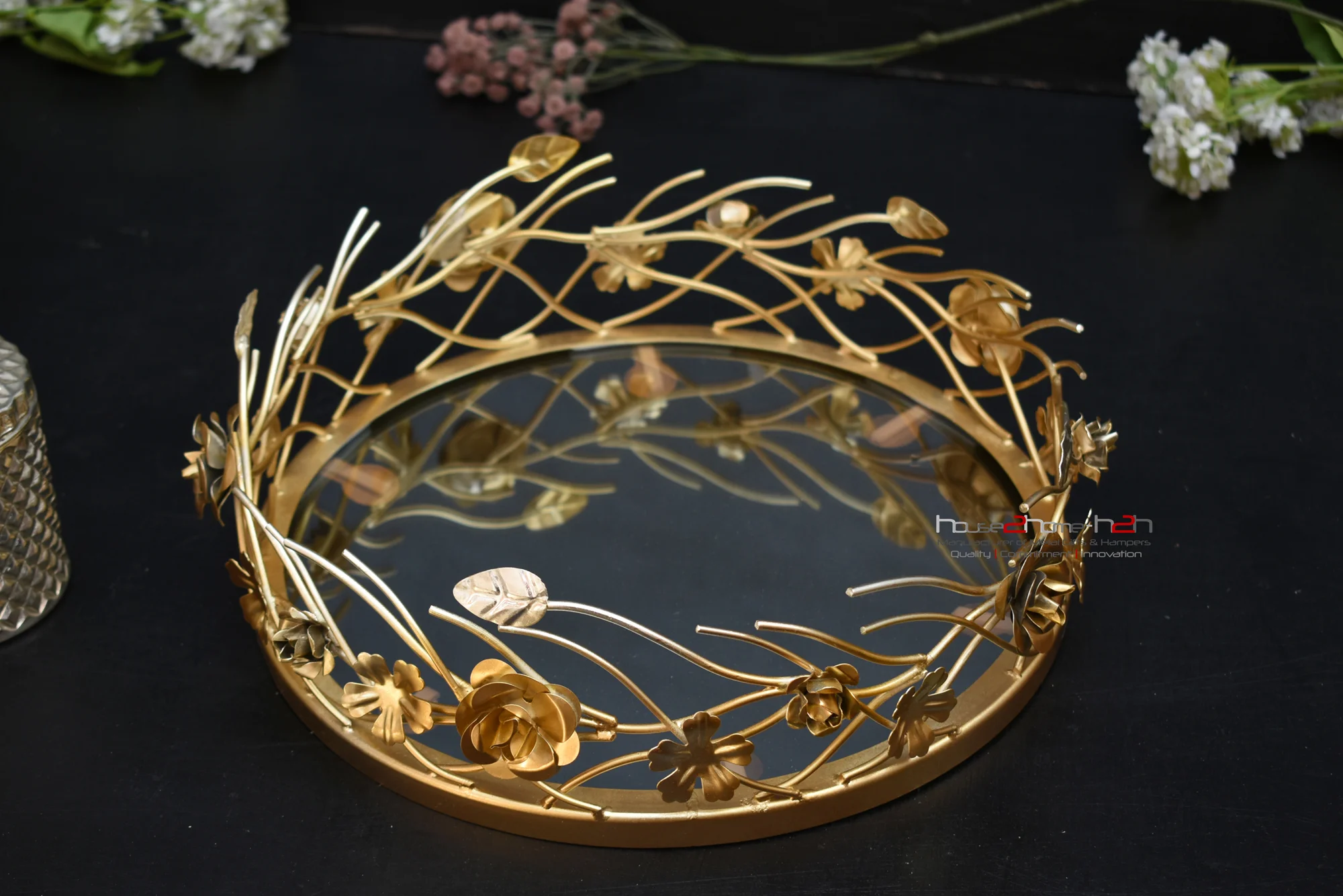 This golden floral tray is perfect for showcasing sweets and festive offerings during Diwali and Dhanteras collections.