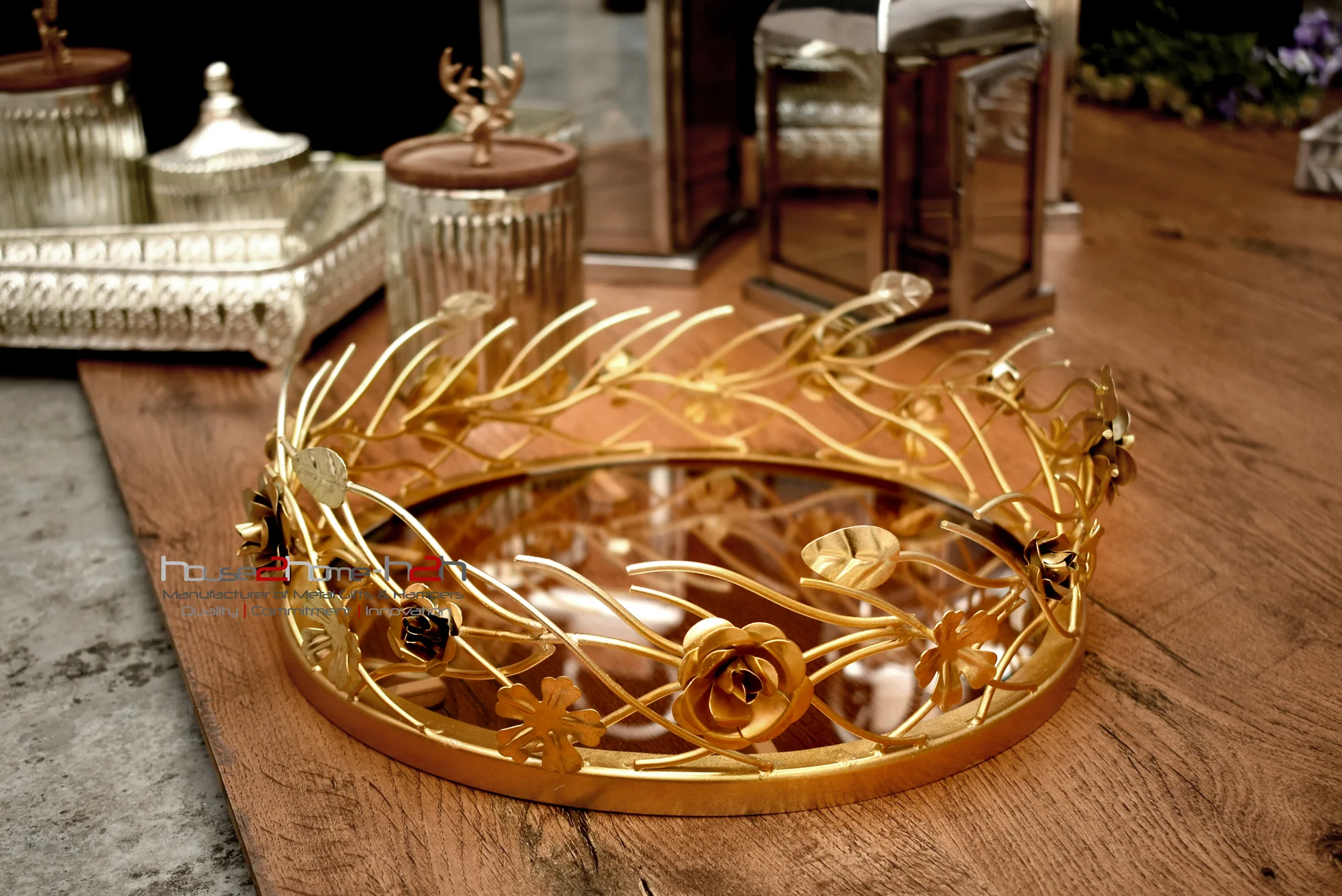 An elegant gold-finished tray, ideal as a centerpiece for premium wedding return gift hampers and shaadi trousseaus.