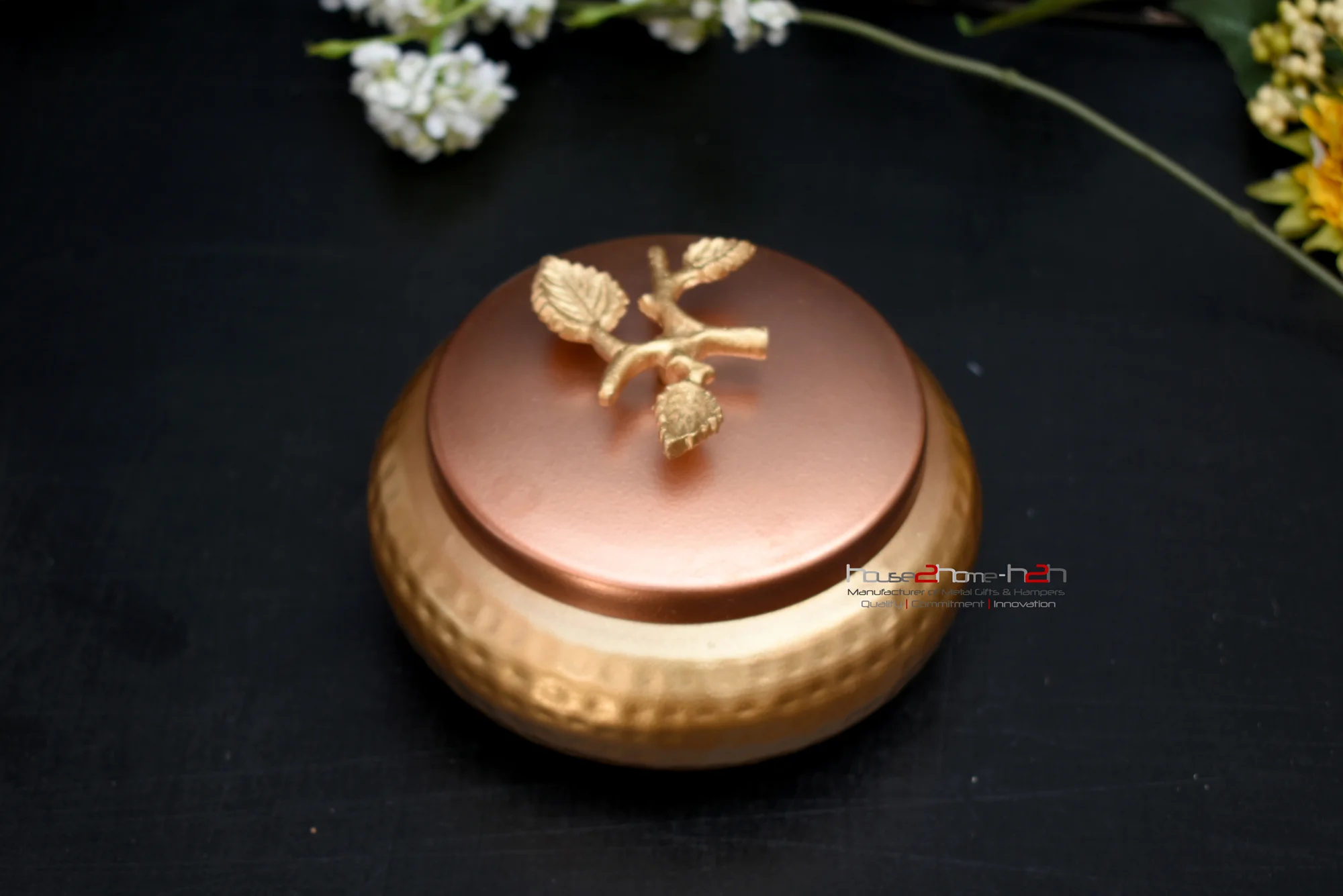 Hand-hammered metal jar with copper lid and golden base for dry fruit storage." Decorative metal candy jar with designer knob for wedding return gifts. Antique finish metal container for kitchen masala storage and gifting, Air tight Jar, Airtight Kitchen Storage, Anniversary Gift Jar, Anniversary Gifts, Antique Finish Container, Antique Silver Jar, Artisan Gifting, baby announcement gift, baby announcement gift box, Baby Shower, baby shower gift box, Baby Shower Gift Jar, best moradabad manufacturer, Birthday Gifting Jar, box manufacturer, Brass Finish Jar, Bridal Trousseau Jar, Bulk Gifting Moradabad, Candy Box, candy jar, chocolate box, Chocolate Jar, Chocolate Packing, Classic Metal Jar with Wooden Lid, Coffee Jar, container, Copper Jar, Corporate Diwali Hamper, Corporate Giveaway Jar, Custom Hamper Packaging, Decorative kitchen jar, Decorative metal container, Decorative metal jar, Decorative metal jar with knob, Decorative Silver Metal Jar, Decorative Storage Jar, Deepavali Hamper, Designer Metal Jars, Diwali Gift, diwali hamper, Diwali hampers, dry fruit box, dry fruit jar, dry fruit jars, Dry Fruit Tray with Jars, Empty Hamper Box for Packing, Food Safe Jar, Gift box, Gift Box for Sweets, Gift Box Manufacturer, gift hamper, Gift Hamper Jars, Gift Jar, Gift Set, Gold Plated Utility Box, Golden, golden jar, h2h, Hammered Metal Container, Hamper Basket, Hamper Box, Hamper Box Manufacturer, Hamper Filler, Hamper gift box, Hamper Jar, Hamper Pack, Handcrafted Premium Gifting, Handicraft Export India, Handicrafts Manufacturer, handmade, Heavy Metal Jar, Heritage Handicrafts India, Hexagonal, Hexagonal jar, House 2 home, house to home, House2home, Housewarming Gift Jar, Housewarming Gifts, Jar Manufacturer, Jar With Lid, Kaju Badam Box, kids hamper box, kitchen jar, Kitchen Mart, Lagan Gifting, Large Box, Large Jar, Laser Cut Metal Box, Lohri Gift Pack, Luxury Chocolate Box, Luxury Potli Box, Luxury Wedding Favors, made in india, Marriage Return Gift, metal box, metal box manufacturer, metal container, Metal container sets, Metal finish jar, Metal Gifts Manufacturer, Metal Handi, Metal Handicrafts Manufacturer, Metal Jar, Metal jar for food storage, Metal jar manufacturer, Metal jar with decorative work, Metal jar with knob, Metal jar with seal, Metal kitchen storage, Metal knob jar, Metal Packaging, Metal storage jar, Metallic Look Jar, Mewa Box, Mithai Box, Mithai ka Dabba, Modern Jar, Mukhwas Jar, Oxidized Silver Jar, Partitioned Gift Box, Pongal Gift Box, Premium Metal Storage Jar, Premium Nut Storage, Rakhi Gift Box, Return Gift, Royal Gifting Box, Royal Look Jar, Seasonal Gift, Silver Coated Jars, Square hamper Basket, Storage Jar, sugar jar, tea coffee jar, Tea Sugar Jar, Traditional Indian Gift Box, trousseau packing, Uphaar Box, Wedding Gift, Wedding Gift Jar, Wholesale Gift Jars, अलंकारिक जार, उत्सव जार, उपहार पात्र, चॉकलेट जार, डेकोर जार, ड्राय फ्रूट जार, दिवाळी जार, दीपावली गिफ्ट डब्बा, परंपरागत डब्बा, परंपरागत बर्तन, पारंपरिक उपहार डिब्बा, पारंपरिक मेटल डब्बा, पीतल ढक्कन, भेटवस्तू डब्बा, मिष्ठान्न पात्र, मेटल जार, शादी उपहार जार, शाही डब्बा, सजावटी जार, सजावटी थाळी, सणासाठी डब्बा, सोनसाखळी झाकण, પરંપરાગત બટ્ટી, પર્વ ઉજવણી ડબ્બો, પિત્તળનું ઢાંકણું, ભેટ માટે ડબ્બો, મીઠાઈ માટે જાર, લોહીનો જાર, શણગાર બોક્સ, அலங்கார ஜார், அலங்காரம் ஜார், கம்பி ஜார், திருவிழா பரிசு, பரிசு பெட்டி, பழமையான ஜார், பித்தளை டோப்பி, விருந்து ஜார், అలంకార డబ్బా, అల్యూమినియం జార్, పండుగ బాక్స్, బహుమతి జార్, లోహపు డబ్బా, లోహపు డిజైన్ జార్, వెండి పూత జార్, ಅಲಂಕರಣ ಡಬ್ಬಿ, ಉಡುಗೊರೆ ಜಾರ್, ಗಿಫ್ಟ್ ಡಬ್ಬಿ, ತಾಂಬೆ ಬಾಟಲಿ, ಪಿತ್ತಳದ ಮುಸುಕು, ಮೆಟಲ್ ಜಾರ್, ಹಂಪರ್ ಜಾರ್, ಹಬ್ಬದ ಬಾಕ್ಸ್, അലങ്കാര ബോക്സ്, ഉത്സവം ജാർ, പാരമ്പര്യ ജാർ, ലോഹ ജാർ, ശൃംഗാര ജാർ, സദ്യ ജാർ, സമ്മാന ജാർ, Affordable gifts, Anniversary Gift, Anniversary Gifts, Antique Finish Container, Artisan Gifting, Artisan handicraft exporter, baby announcement gift, baby announcement gift box, Baby announcement Hampers, baby announcement sweet box, Baby Shower, baby shower gift, baby shower gift box, Baby Shower Gift Jar, Baby shower gifts, basket, basket jute, baskets for gifting, baskets for gifts, Bespoke Hamper Solutions, Best Anniversary gifts, Best Gift Manufacturer, Best Gift option, Best Handicraft manufacturer, best moradabad manufacturer, Best quality customised gift, Best Wedding Gifts, birthday gift, Birthday Gift Box, Birthday Gift Return, Birthday Hamper, Birthday return gifts, box, box manufacturer, Brass Finish Jar, Brass handicraft gift, Bridal Trousseau Jar, Bulk Gift Supplier, Bulk Gifting, Bulk Gifting Jar, Bulk Gifting Moradabad, Bulk Wedding Gifts, cake boxes, candle holder, candle Jar, candle set, Candle Stand, candle stand holder, candy jar, chocolate box, Chocolate Hamper, Chocolate Jar, Chocolate Packing, christmas gift hampers, christmas gift ideas, Classic Metal Jar with Wooden Lid, Classy Gifts, Classy wedding gift recommendations, Coffee Jar, container, Copper Gifts, Copper Jar, Corporate Diwali Hamper, corporate gift, Corporate Gift jar, Corporate Gifting, Corporate Gifting Ideas, Corporate Gifts, corporate gifts branded, Corporate Giveaway Jar, Custom Gift, Custom Hamper Packaging, Decorative Basket, Decorative Dibbi, decorative fruit basket, Decorative Gift, Decorative gifts, Decorative Jar, Decorative kitchen jar, Decorative metal container, Decorative metal gift box, Decorative metal jar, Decorative Storage Jar, Decorative Trays, Decorative utility gift, Deepavali Hamper, Designer golden jars, Designer Metal Jars, Designer sweet box, Diwali Gift, Diwali Gifts, diwali hamper, Diwali hampers, dry fruit box, dry fruit container, dry fruit jar, dry fruit jars, Dry Fruit Tray with Jars, Empty Hamper Box for Packing, Export Quality gift Items, Factory direct gift Supplier, festival gift, Festival Gifting, Festival Gifts, Food Safe Jar, Food Tray, Fruit Basket, gift, Gift Basket, gift baskets delivery, Gift box, gift box for men, Gift Box for Sweets, gift hamper, gift hamper basket, Gift Hamper Jars, Gift hampers, gift hampers for men, gift hampers for women, gift idea, gift ideas, Gift Items, Gift Jar, Gift Set, Gifting Jar, gifts, Gifts hampers, Glass Barni, Glass Box, glass container, glass Jar, Gold Plated Utility Box, Golden, golden jar, great gift idea, h2h, Hammered Metal Container, Hammered Metal Jar, Hamper Basket, Hamper Box, Hamper Box Manufacturer, Hamper Filler, Hamper gift box, Hamper Jar, Hamper Pack, hampers, hampers for men, Handcrafted golden metal jar for wedding hampers, Handcrafted Metal Jar, Handcrafted Premium Gifting, handi, Handicraft Export India, Handicrafted Luxury Home Products India, Handicrafts Manufacturer, Handmade décor gift, Handmade Gifting, Heavy Metal Jar, Heritage Handicrafts India, home decor, Home Decor Gift, Home Decorative, House 2 home, house to home, House warming gifts, House2home, Housewarming Gift Jar, Housewarming Gifts, Housewarming jar, Housewarming return gift jar, Indian handicraft, Indian handicraft bulk, Iron Candle Holder, Jar, Jar Manufacturer, Jar With Lid, Jars, Jute Basket, Kanch ka Jar, kids gift box, kids hamper box, kitchen jar, Kitchen organizer, Leading bulk wedding gift, Lohri Gift Pack, Low Budget Gifts, Luxury Chocolate Box, Luxury Designer organizer, Luxury Diwali gift hampers, Luxury dry fruit box for Diwali gifting, Luxury Gift Hampers, Luxury Gifts, Luxury Potli Box, Luxury Wedding Favors, made in india, marriage gift ideas, Marriage Return Gift, matki, Metal Basket, metal box, metal box manufacturer, metal container, Metal container sets, Metal container with wooden lid, Metal finish jar, metal frame, metal gifts, Metal Gifts Manufacturer, Metal Handi, Metal Handicraft, Metal Handicrafts, Metal Handicrafts Manufacturer, Metal Jar, Metal jar for food storage, Metal jar manufacturer, Metal jar with knob, Metal jar with seal, Metal jars with lids for bulk corporate gifting, Metal Planter, metal stand silver trays, Metal storage jar, Metal TRay, Metal Wire, Metallic Look Jar, Mewa Box, Modern Jar, Moradabad Handicraft, Mukhwas Jar, Naming ceremony gifts, Occasional gifts, Occassional gift, Occassional Gifting, Oxidized Silver Jar, Partitioned Gift Box, pichwai tray, Pongal Gift Box, premium gift, Premium Gift Jar, Premium Gifts, Premium Handicrafts, Premium Metal jar, Premium Metal Storage Jar, Premium Nut Storage, Premium wedding gift, Rakhi Gift Box, rasgulla box, rasgulla jar, Return Favour, Return Gift, Return Gifts, round tray, Royal Gifting Box, Royal Look Jar, Seasonal Gift, seasonal gifting, Seasonal Gifts, serving tray, Silver Coated Jars, Square hamper Basket, Storage Basket, Storage Jar, sugar jar, Sweet box, Taditional Gifts, tea coffee jar, Tea Sugar Jar, the box, Traditional handmade Gift, traditional Indian gift, Traditional Indian Gift Box, tray box, tray for gifting, tray serving tray, trousseau packing, unique gift, Unique gifts, urli bowl, Wedding anniversary gift, Wedding anniversary gifts, wedding favour, Wedding Gift, Wedding Gift Jar, Wedding Gift Supplier, Wedding Gifts, Wedding Gifts for Couple, Wedding Return Gift, Weddings and Parties Gift Items, Wholesale Gift Jars, Wire Basket, Wire Mesh Basket
