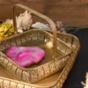 Handcrafted metal and marble decorative coaster set featuring an elegant gold finish rim for table protection.