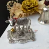 A meaningful German silver Kamdhenu idol, perfect as a thoughtful wedding return gift for sacred shaadi ceremonies.