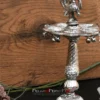 : Intricate German silver peacock diya stand perfect for a Griha Pravesh housewarming or religious pooja ceremony.