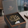A corporate gift set showcasing an intricate brass tree of life sculpture crafted by House2Home.