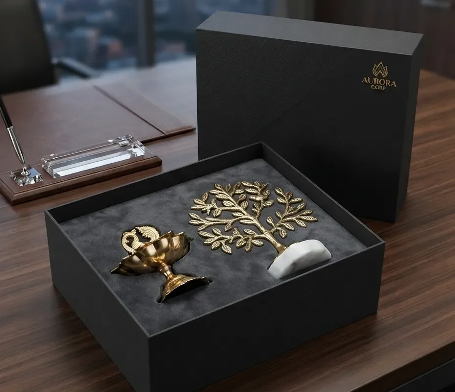 Elegant handcrafted brass diya and Tree of Life sculpture set featuring premium marble and metal finishing.