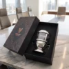 elegant metallic glass diya showcasing a reflective finish and sleek presentation style.