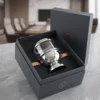 A traditional designed metal and glass decorative diya set featuring a polished silver border.