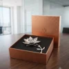 An exquisite silver metal lotus tealight holder set showcasing intricate petal detailing and vibrant base.