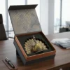 An elegant peacock ornament, perfect for sophisticated shaadi return gift hampers and wedding ceremony favors.