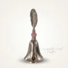 This decorative bell in a festive setting captures the spirit of Diwali and Dhanteras home gifting collections.