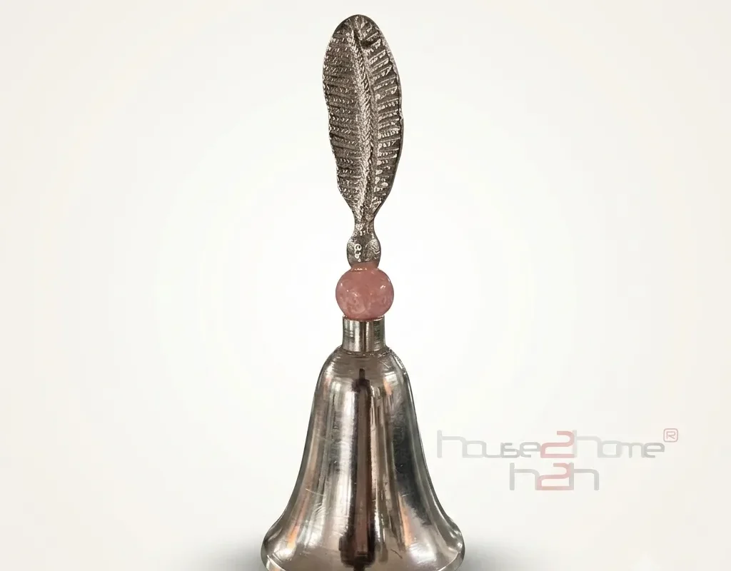 This decorative bell in a festive setting captures the spirit of Diwali and Dhanteras home gifting collections.