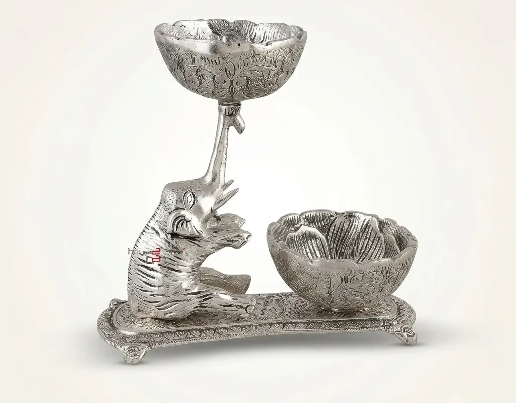 German silver Ganesha dry fruit bowl set with decorative serving bowls for festive décor and elegant gifting.