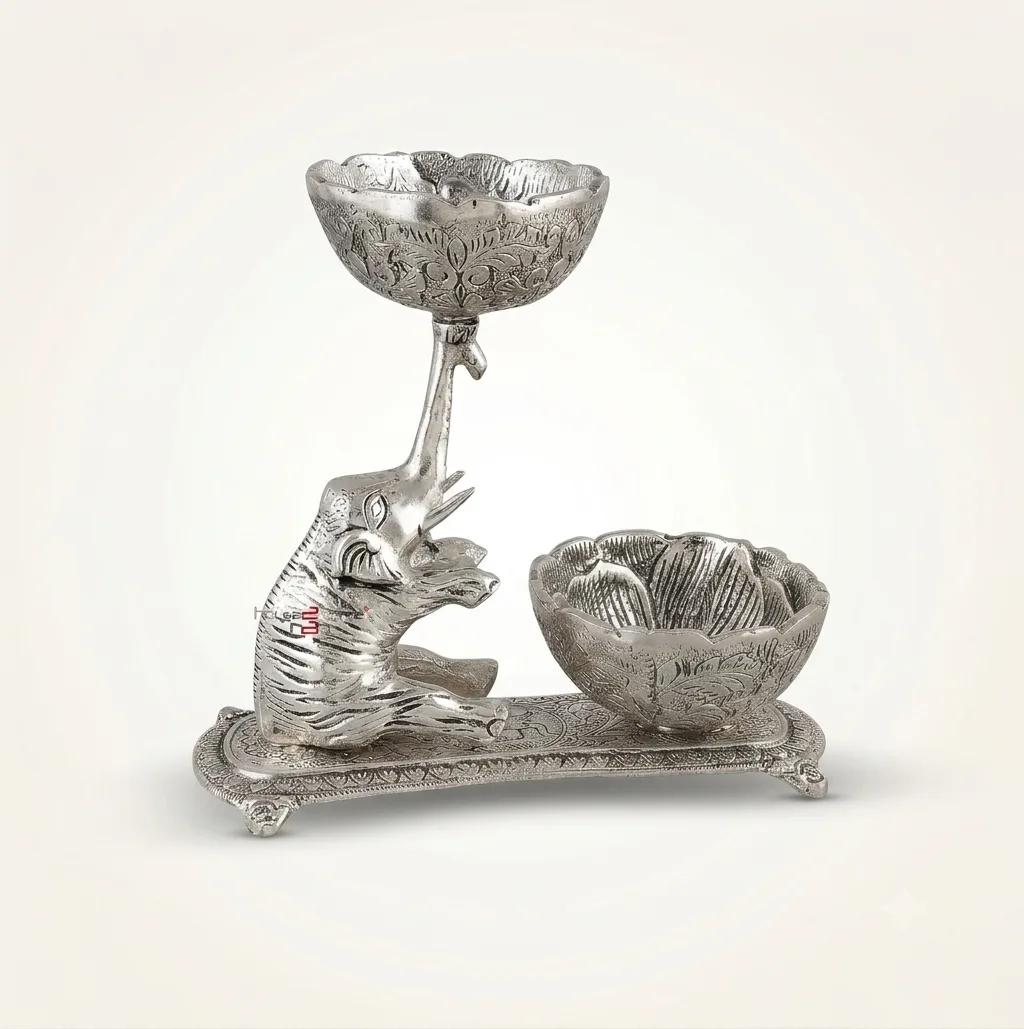 German silver Ganesha dry fruit bowl set with decorative serving bowls for festive décor and elegant gifting.
