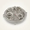 A traditional German silver thali set, perfect for elegant wedding return gift hampers and shaadi ceremony rituals.