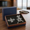 A premium German silver Venkateswara idol and peacock diya gift set, securely nested in a custom presentation box.