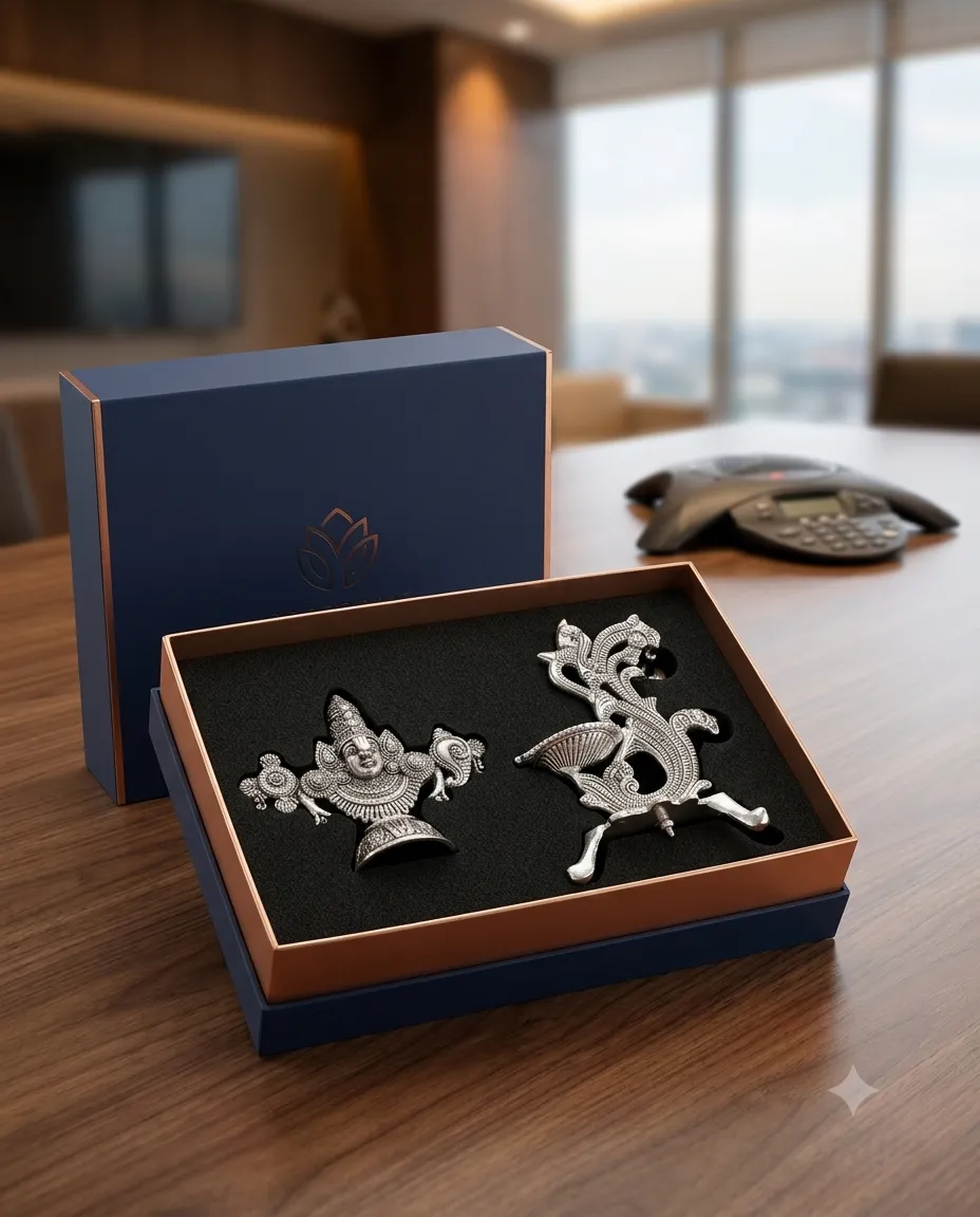 A premium German silver Venkateswara idol and peacock diya gift set, securely nested in a custom presentation box.