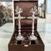 Elegant German silver standing pooja diya in a gift box, wonderful for Griha Pravesh and religious ceremonies.
