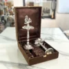 Traditional German silver peacock oil lamp in a decorative box, perfect for Diwali and auspicious Dhanteras gifting.