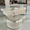 Ornate German silver mesh container set arranged for luxury wedding return gifts and shaadi ceremony hampers.