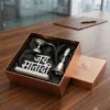 A German silver ritual gift set featuring a decorative Jay Mata Di script, a traditional diya, and a ceremonial bell.