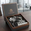 A premium German silver gift set featuring a decorative lotus diya, a ritual bell, and a Jay Mata Di script in a display.