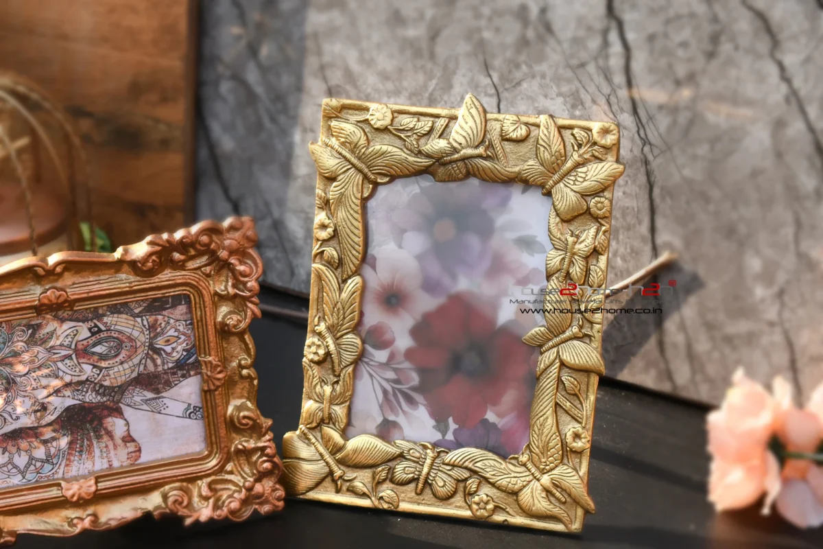 Elegant metal portrait frame with a vintage-inspired artisan border crafted by House2Home for home decor.