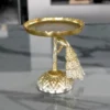 Gold finished peacock pedestal tray styled inside a festive Diwali and Dhanteras gift hamper.