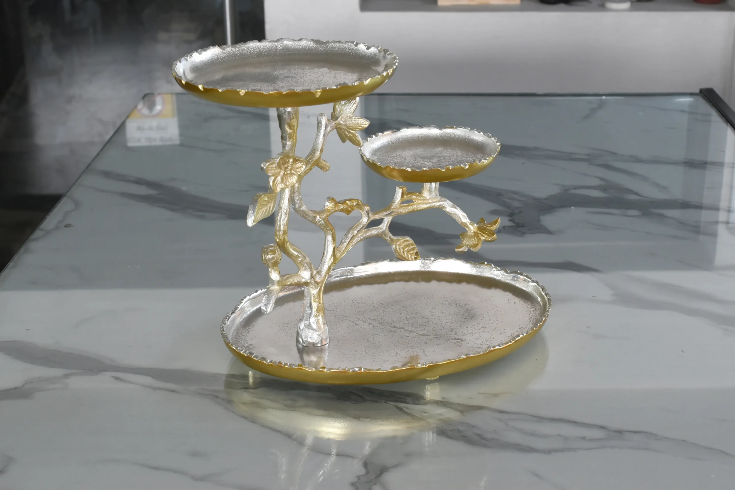 Decorative branch platter stand ideal for Griha Pravesh gifts and sacred family celebration arrangements.