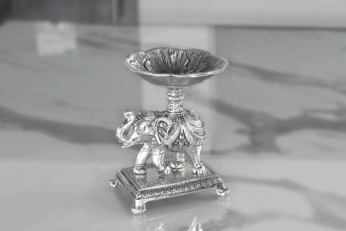 Silver plated elephant bowl stand designed for executive corporate festive gifts and business appreciation tokens.