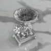 Silver royal elephant pedestal bowl arranged inside an opulent festive hamper for Diwali and Dhanteras gifting.