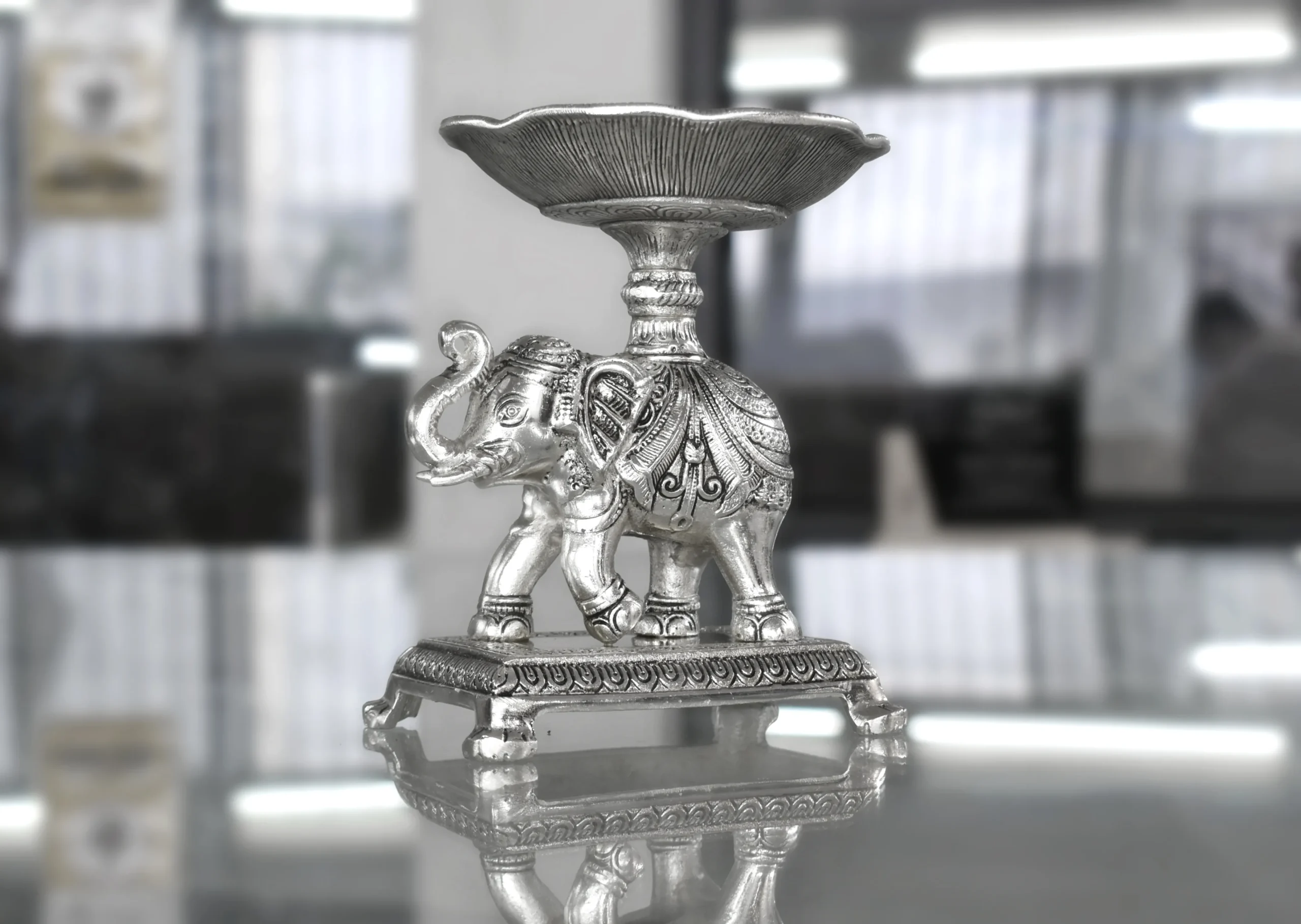 Auspicious silver elephant lotus bowl holder ideal for Griha Pravesh return favors and pooja decor sets