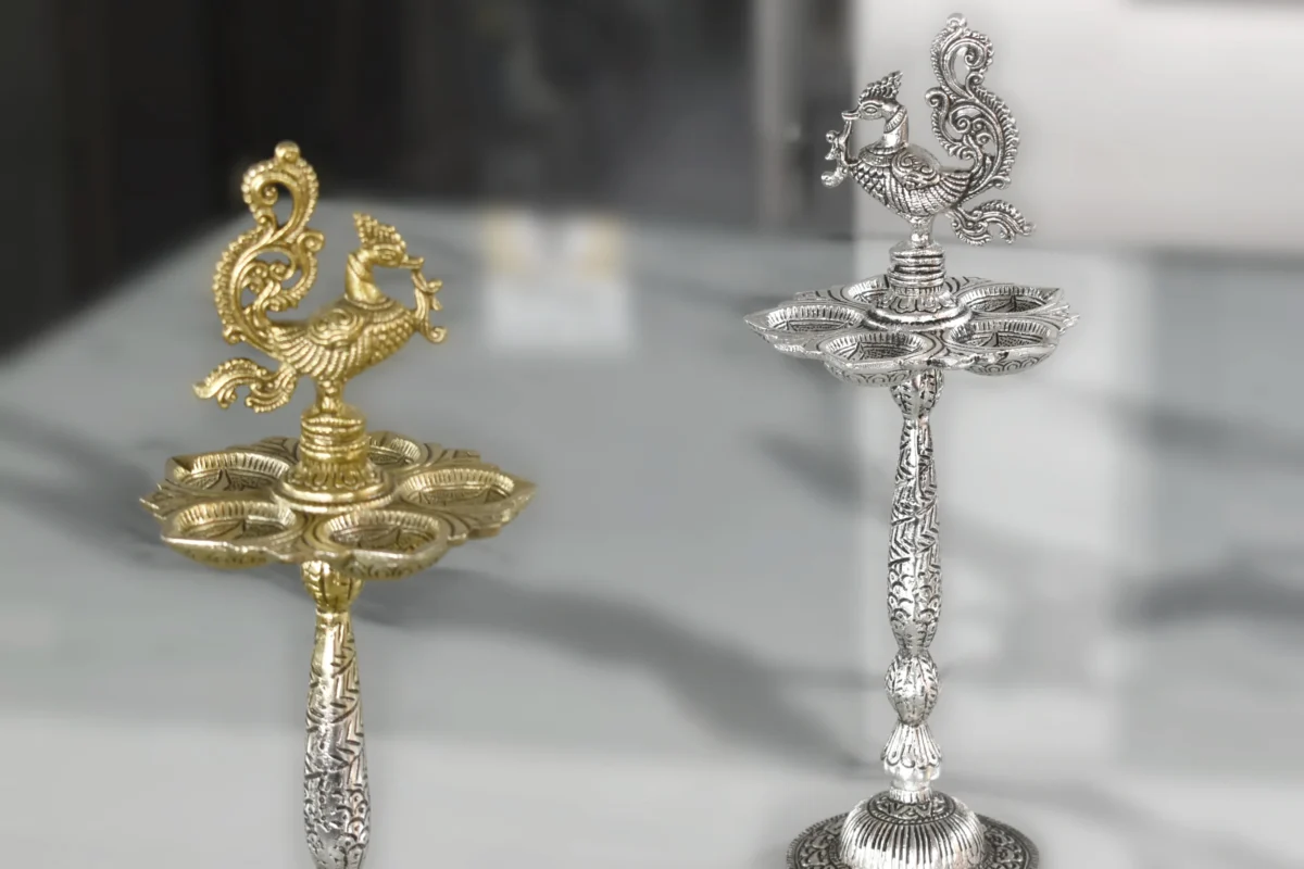 Premium German silver peacock diya stand for executive festive corporate gift collections.