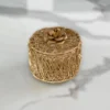 Intricate gold wire trinket container presented as a luxury shaadi return gift box for wedding guests.