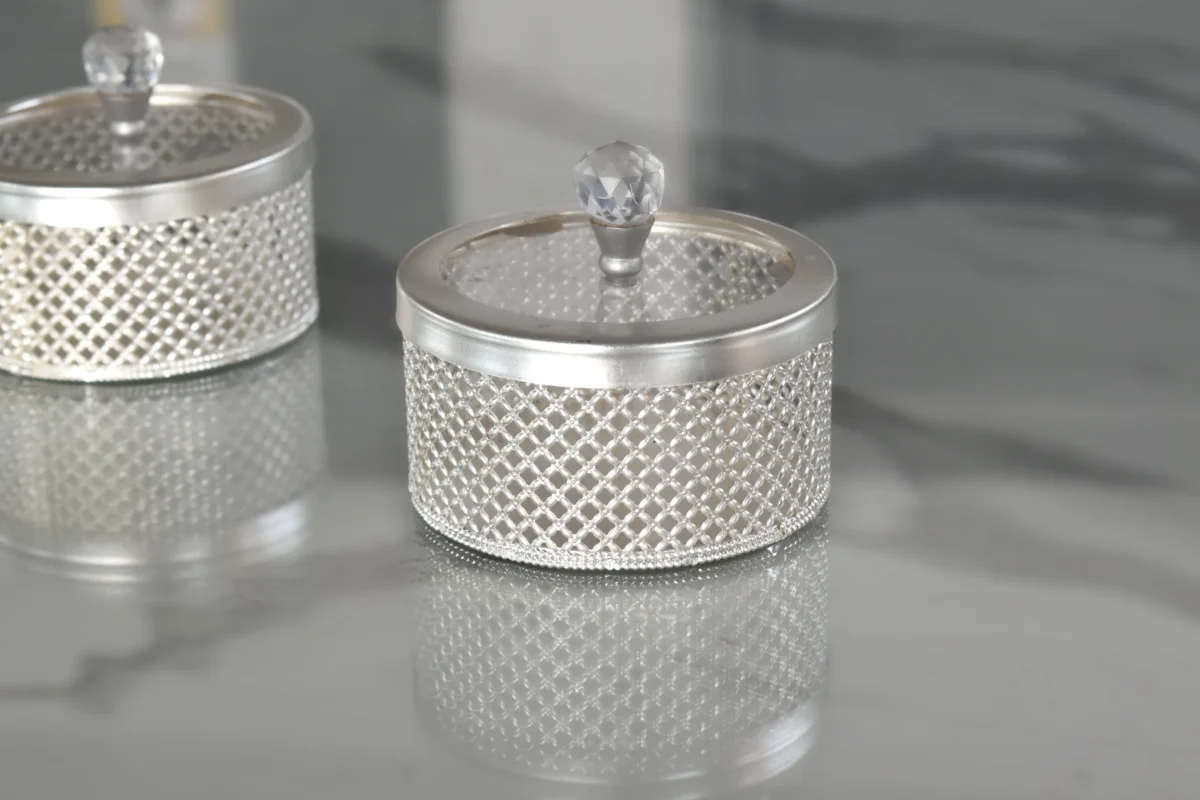 Ornate silver mesh container styled as a luxury return gift favor for traditional shaadi guests.