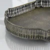 Vintage-style Moradabad brass vanity tray with intricate embossed floral patterns and a decorative pierced gallery rim