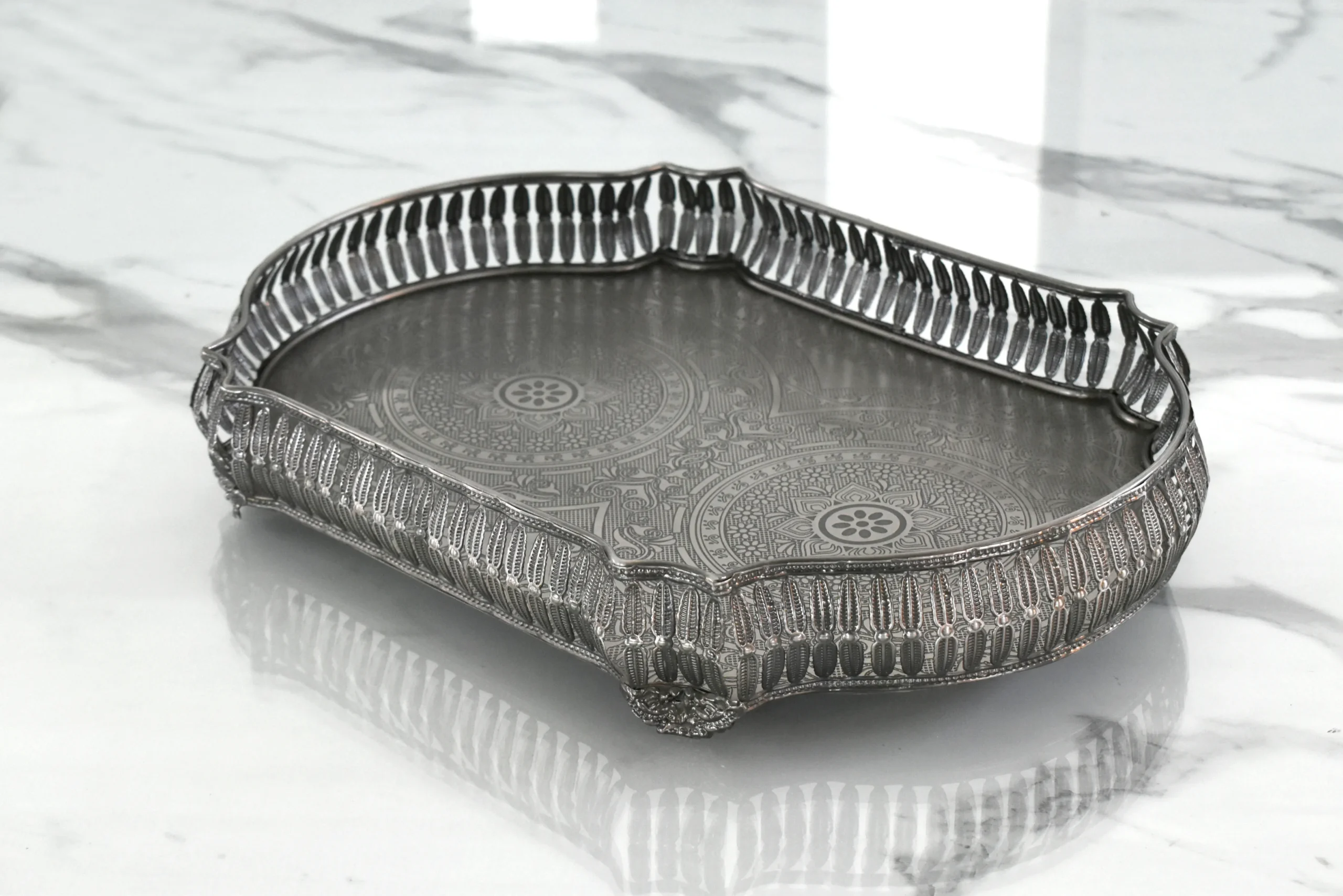Antique silver finished metal serving tray with pierced gallery rim and engraved base by House2Home.