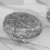 Embossed silver keepsake box ideal for Griha Pravesh return favors and traditional pooja hampers.