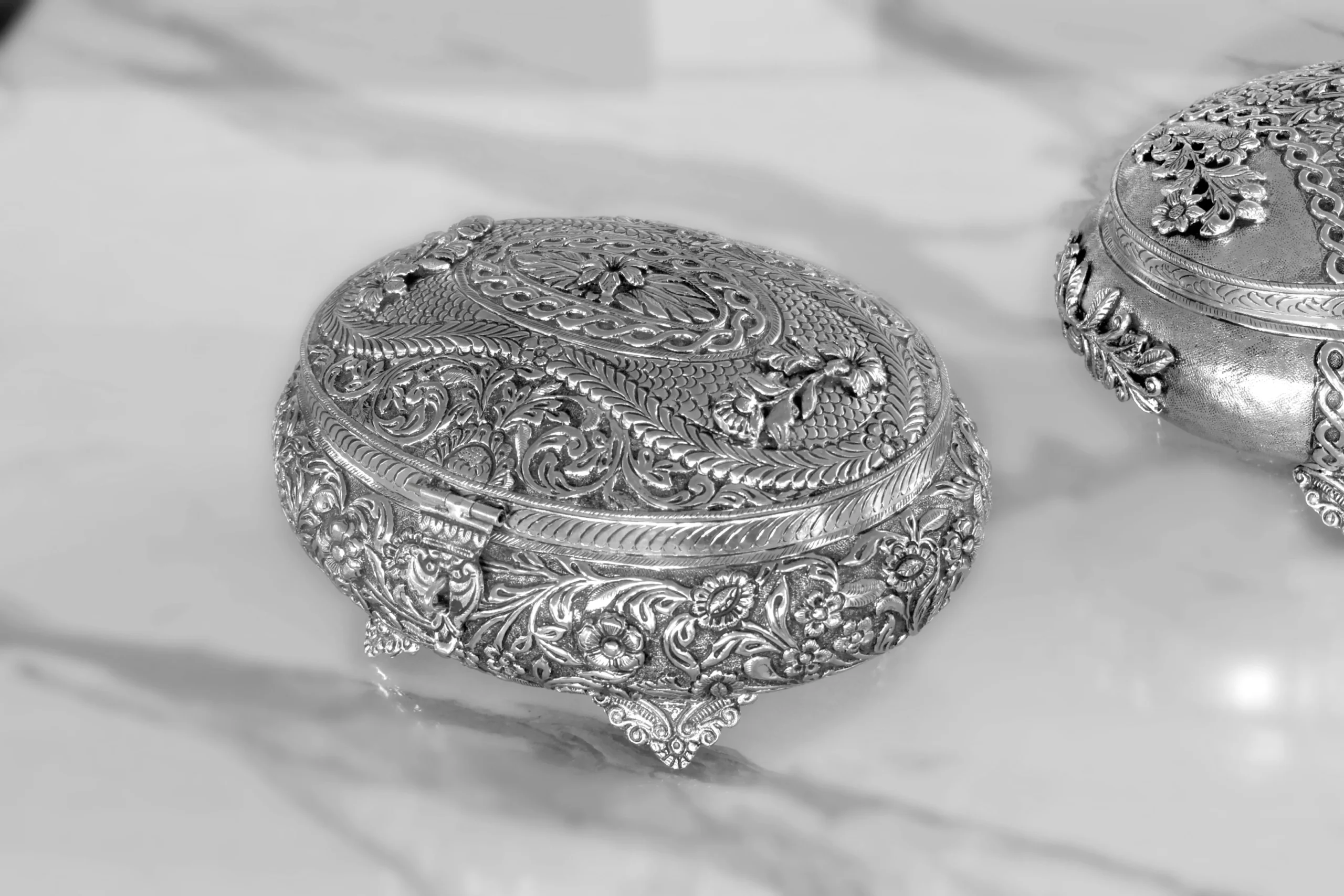 Embossed silver keepsake box ideal for Griha Pravesh return favors and traditional pooja hampers.