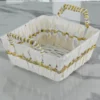Ornamental square storage basket featured in a Diwali festive hamper and Dhanteras setup.