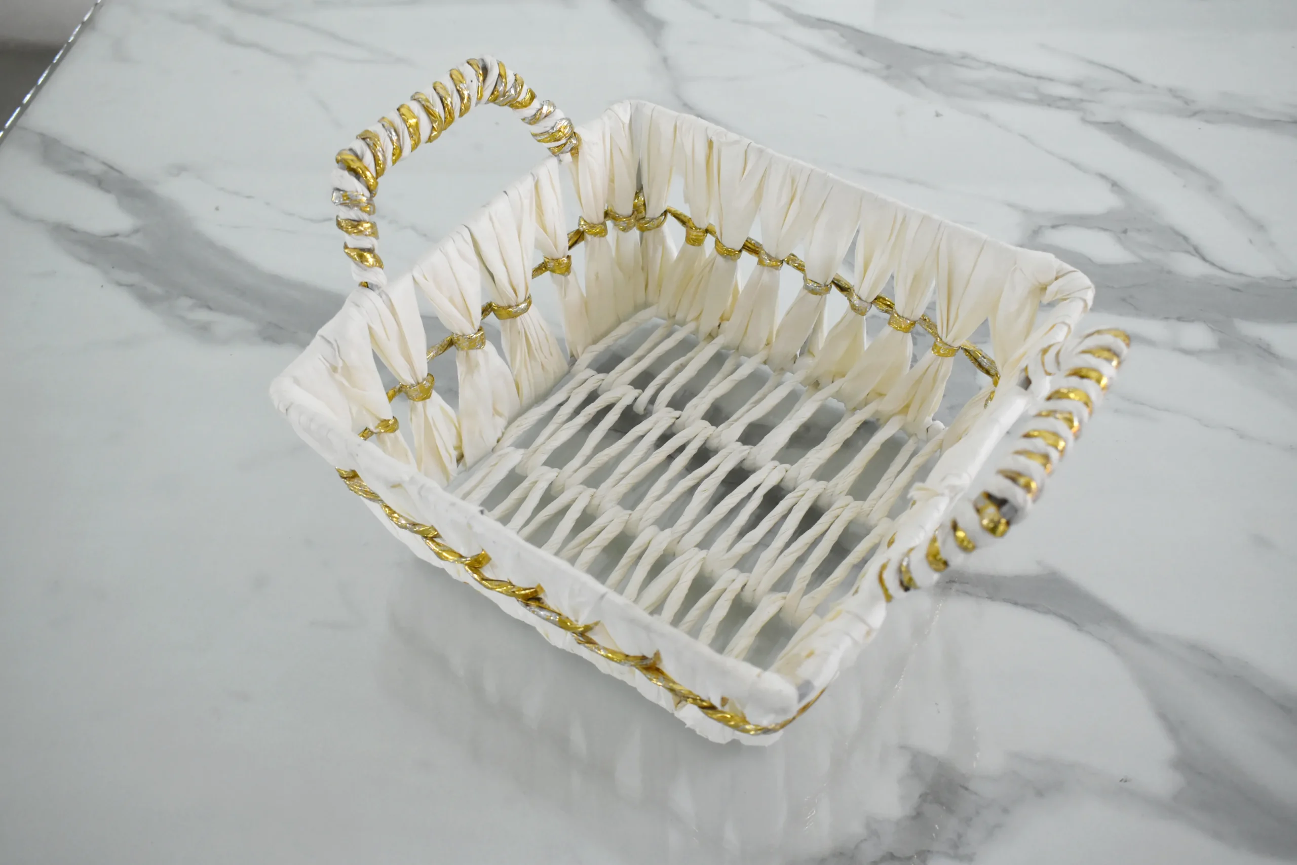 White and gold woven gift basket styled for luxury wedding trousseau and shaadi ceremony hampers